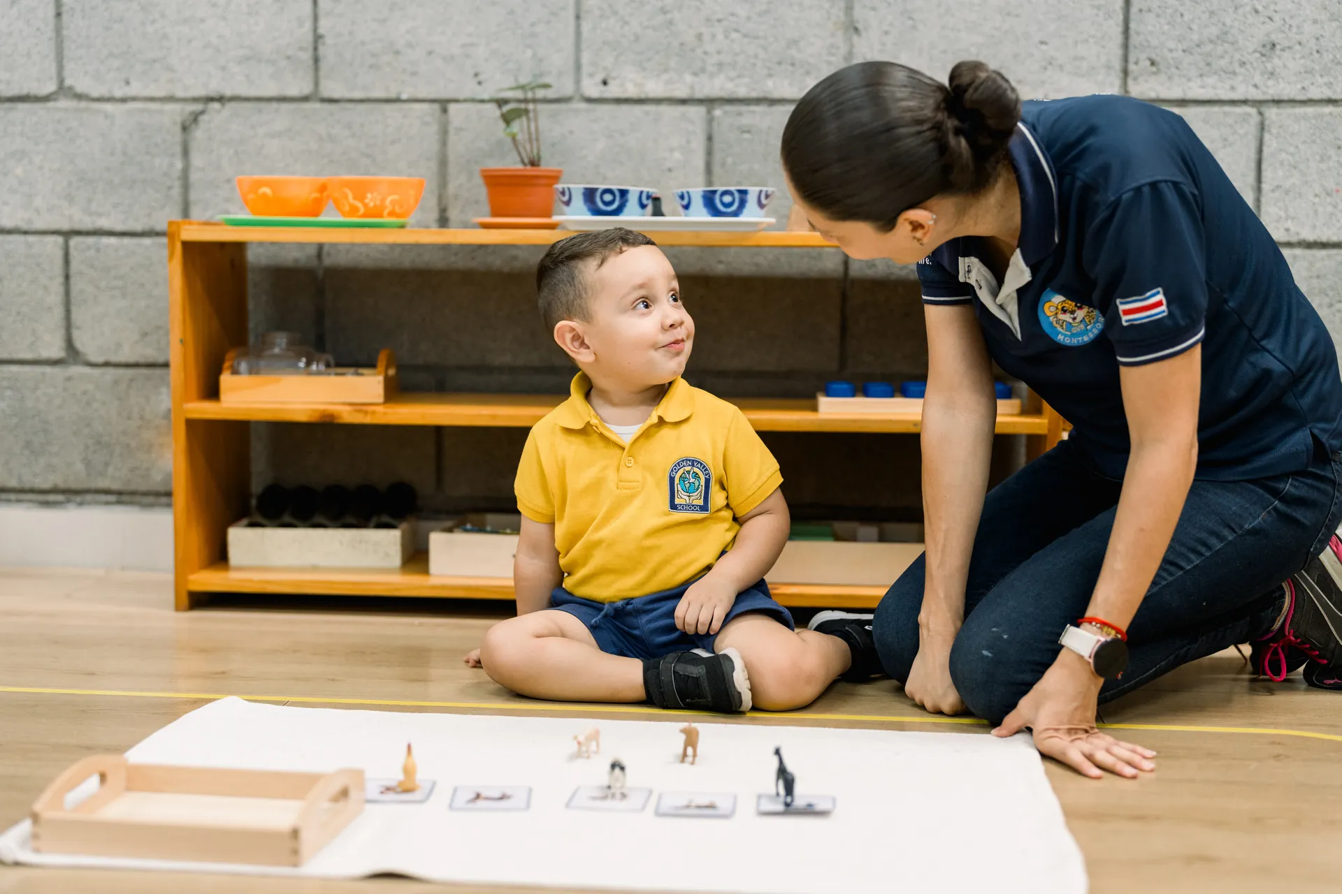 Montessori child working with hands-on learning materials